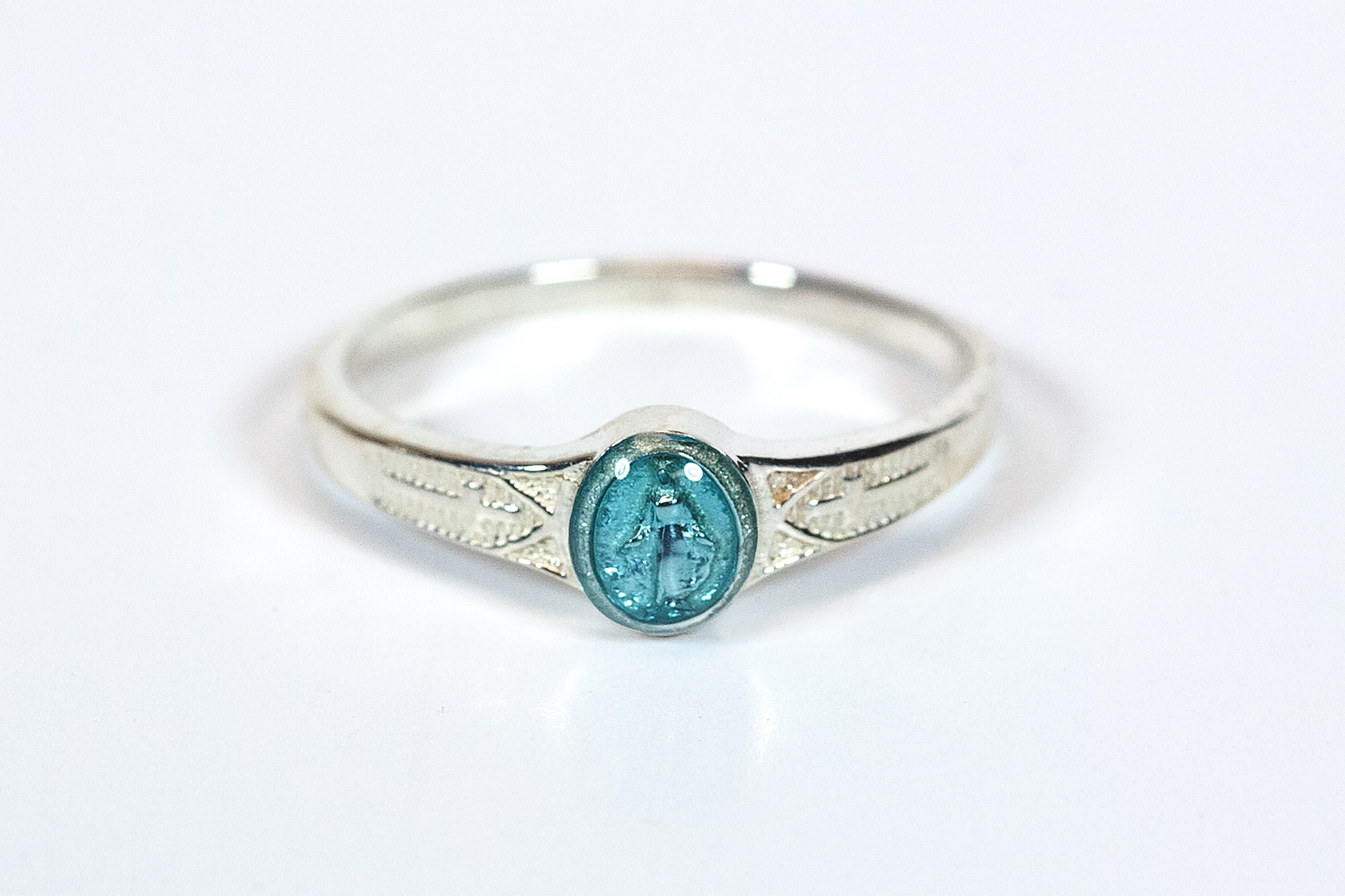 Sterling Silver Miraculous Ring with Blue Epoxy Accent