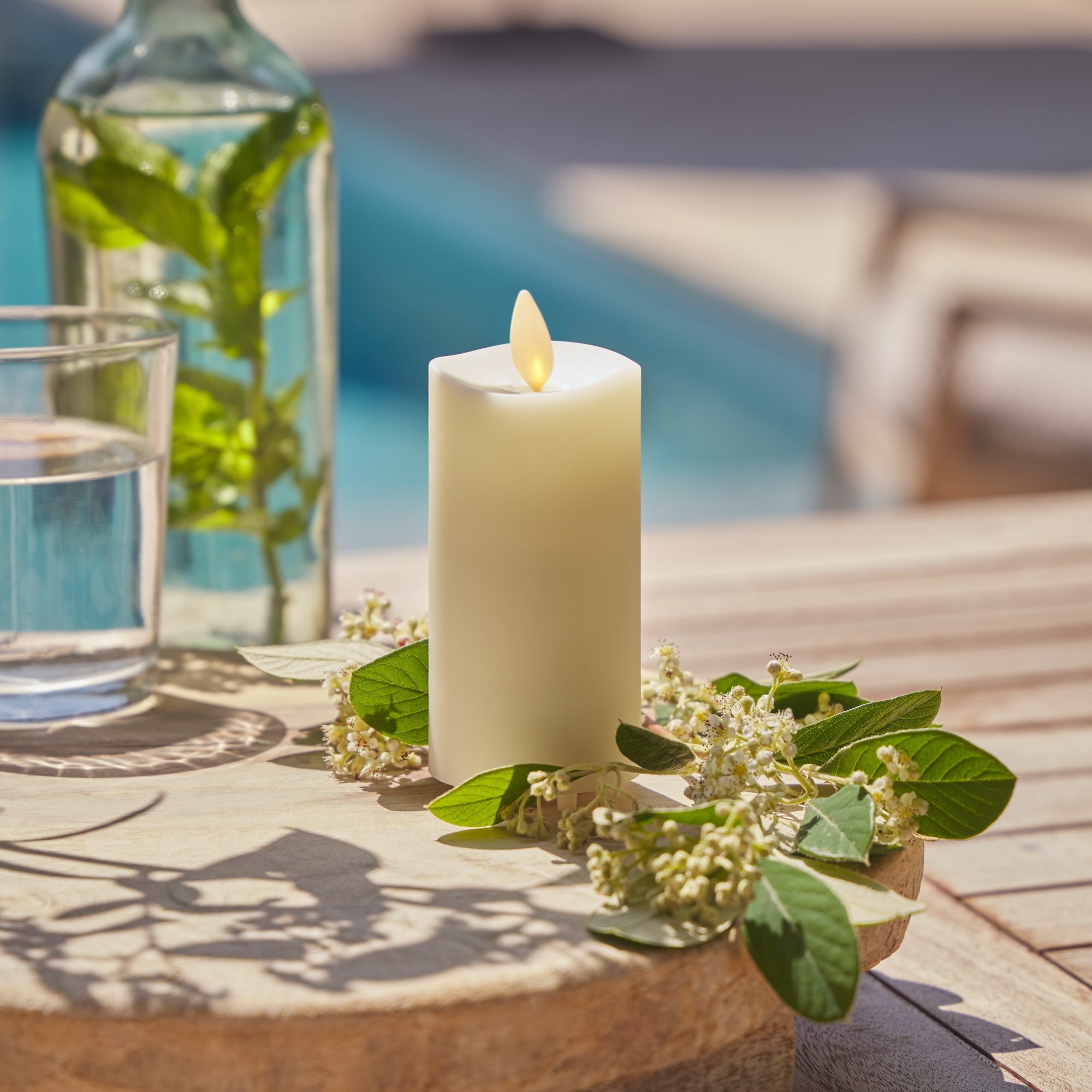 Luminara Ivory Outdoor Flameless Candle Slim Pillar - Melted Top