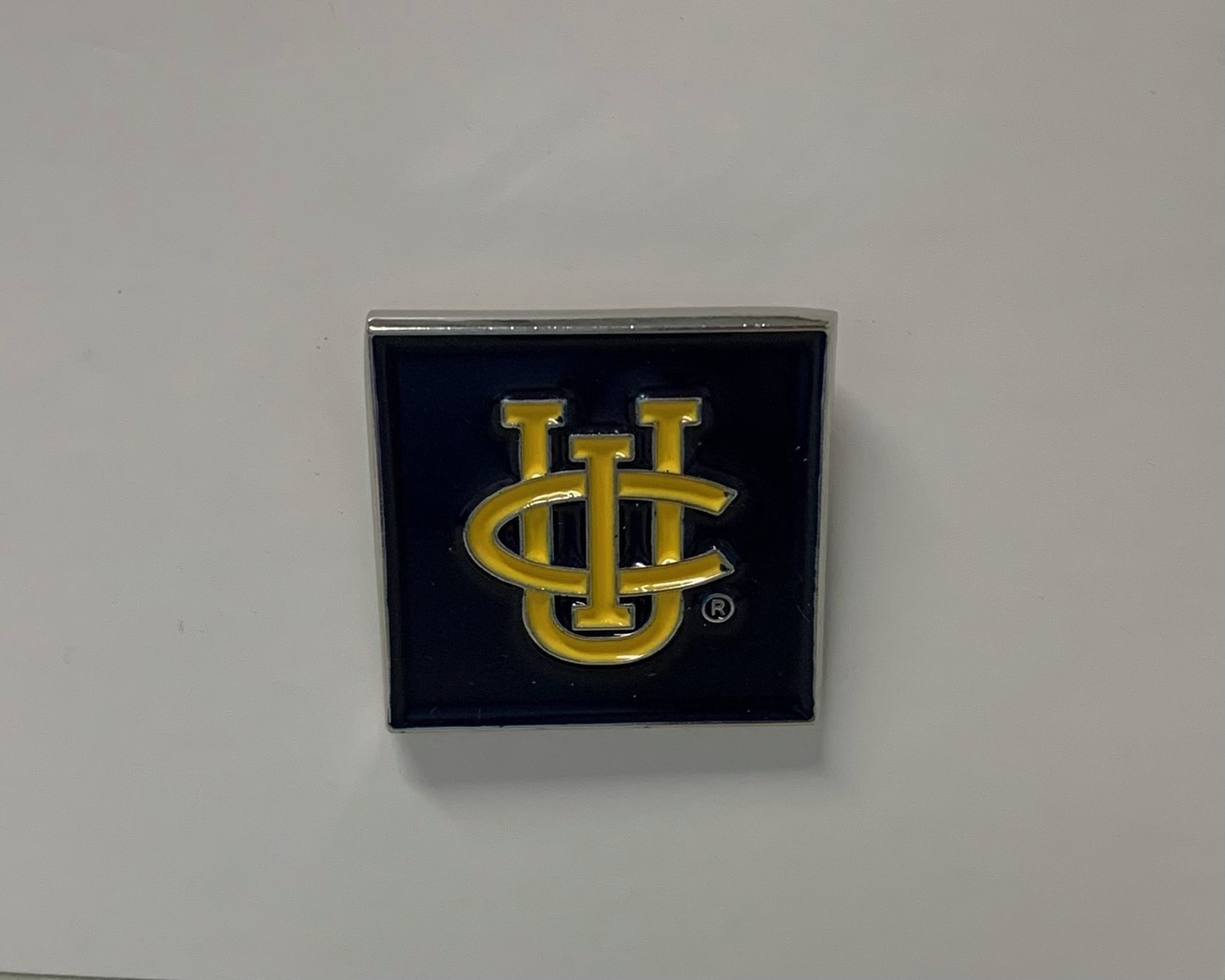 UCI Interlock Lapel Pin