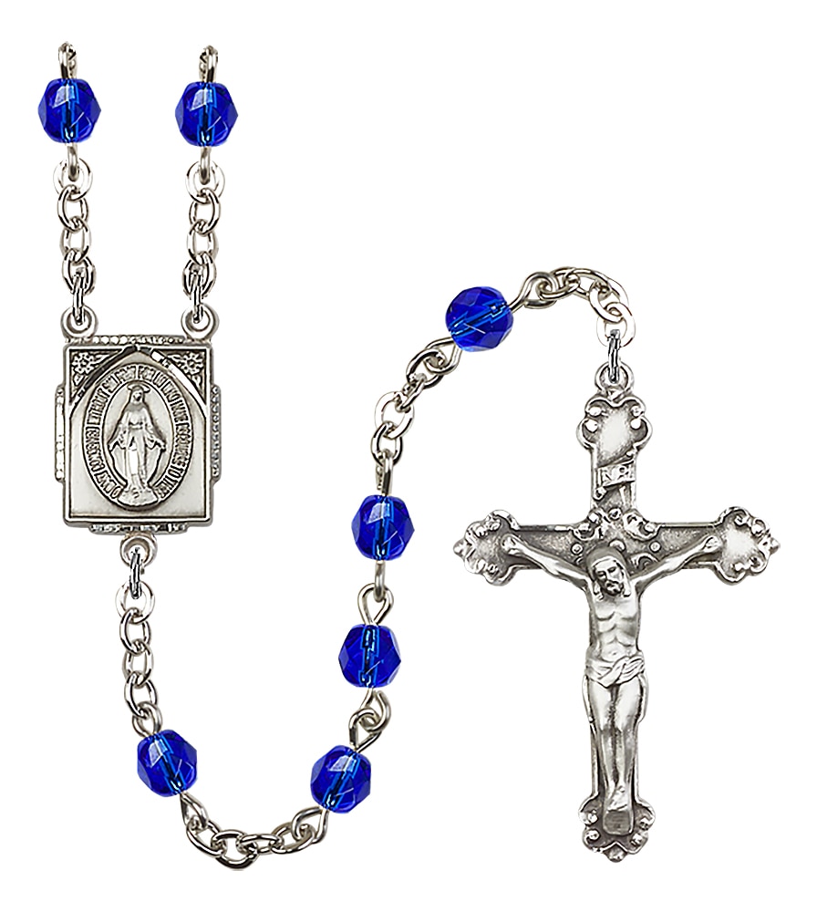 Rosary is Silver-Plated with 6mm Fire-Polished beads in Dark Blue   Crucifix is 1 1/2-inch tall and 1-inch wide   Miraculous Medal centerpiece is 5/8-inch tall and 1/2-inch wide Handmade in the USA