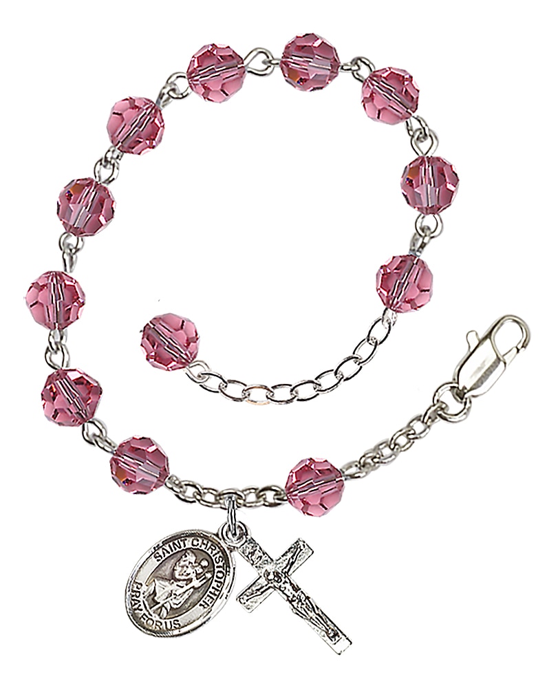 Rosary bracelet is Silver-Plated and can be adjusted between 7 1/2 and 8 1/2-inches   Beads are 6mm Rose Colored, Austrian Crystal   Crucifix is 5/8-inch tall by 1/4-inch wide   Miraculous Medal is 1/2-inch tall by 1/4-inch wide Handmade in the USA