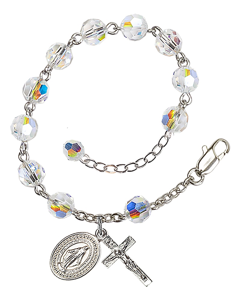 Rosary bracelet is Silver-Plated and can be adjusted between 7 1/2 and 8 1/2-inches   Beads are 6mm Austrian Crystal with aurora borealis (prism-like effect)   Crucifix is 5/8-inch tall by 1/4-inch wide   Miraculous Medal is 1/2-inch tall by 1/4-inch