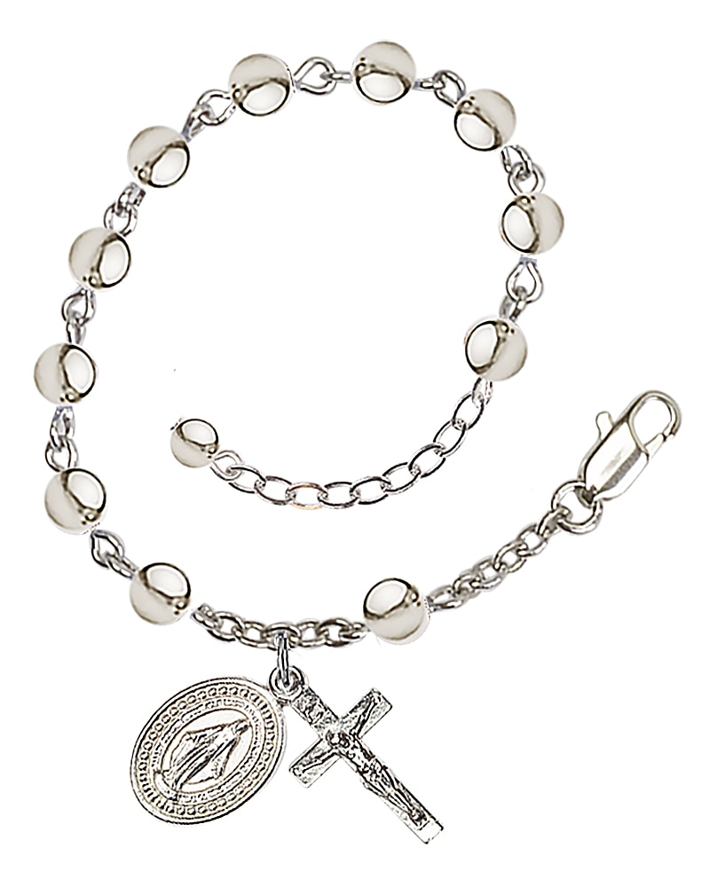 Rosary bracelet is Silver-Plated and can be adjusted between 7 1/2 and 8 1/2-inches   Beads are 6mm round   Crucifix is 5/8-inch tall by 1/4-inch wide   Miraculous Medal is 1/2-inch tall by 1/4-inch wide Handmade in the USA