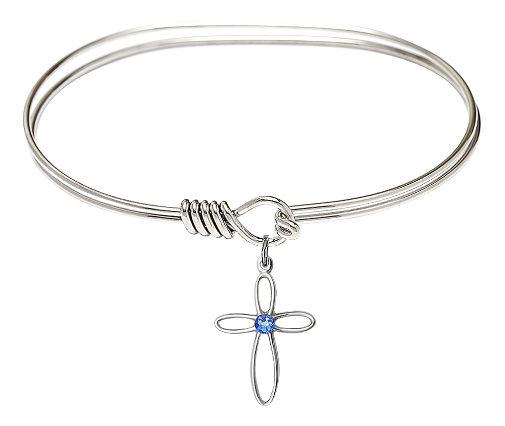 Rhodium Plated 7in Bangle Bracelet with Sterling Silver Loop Cross with Dark Blue Austrian Crystal Stone