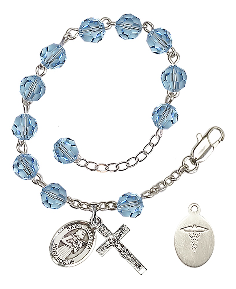 Rhodium Plated/Pewter 6mm Austrian Crystal Aqua Rosary Bracelet 7 1/2-inch with St. Agatha/Nurse Charm and Crucifix